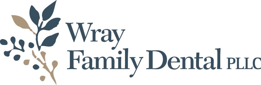 Wray Family Dental PLLC logo with leaf branches